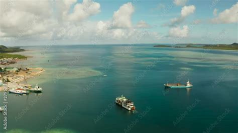 Passenger Port With Ferries And Cargo Ships On The Island Of Siargao