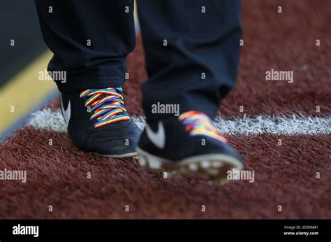 The fourth official wears rainbow laces to show support for the ...