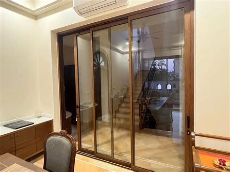 Brown UPVC Glass 3 Track Sliding Door Height 90 Inch Interior At