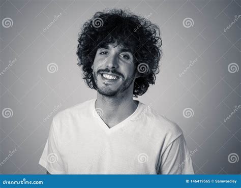 Portrait Of Attractive Cheerful Young Man With Smiling Happy Face