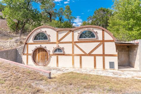 This San Antonio Area Log Cabin Comes With Its Own On Site Hobbit House