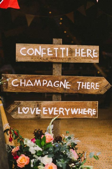 A Wooden Sign That Says Confetti There Champagne There Love Everywhere