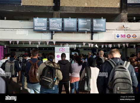 Passengers wait at Barking Station in East London in the morning as the national rail strike ...