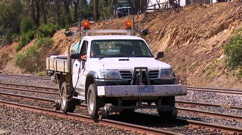 High Rail Aka Hi Rail Utility Vehicle On Train Tracks Nissan