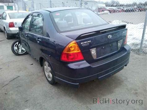 Report JS2RA41S225107266 SUZUKI AERIO 2002 BLUE GAS Price And Damage