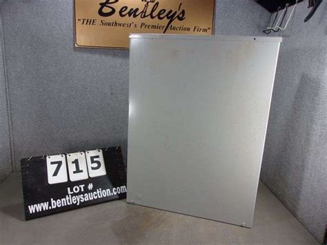 LARGE GRAY METAL FUSE BOX - Bentley & Associates, LLC