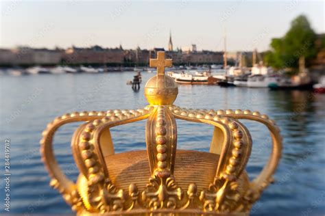 Swedish Royal crown on Skeppsholmen Bridge in central Stockholm, Sweden ...