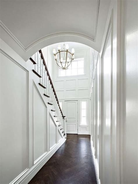 Long Foyer Hall Boasts A Barrel Cieling And A Wood Herringbone Floor