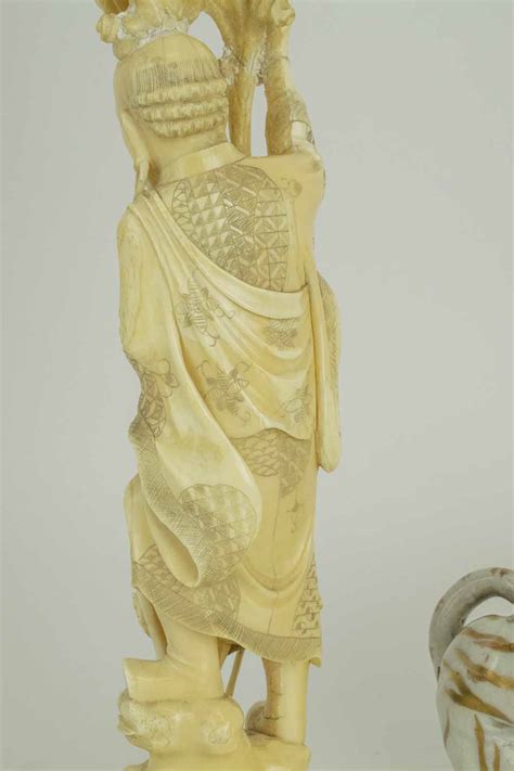 A Japanese Ivory Carved Figure Circa 1910 Restored 38cm H A Pair Of