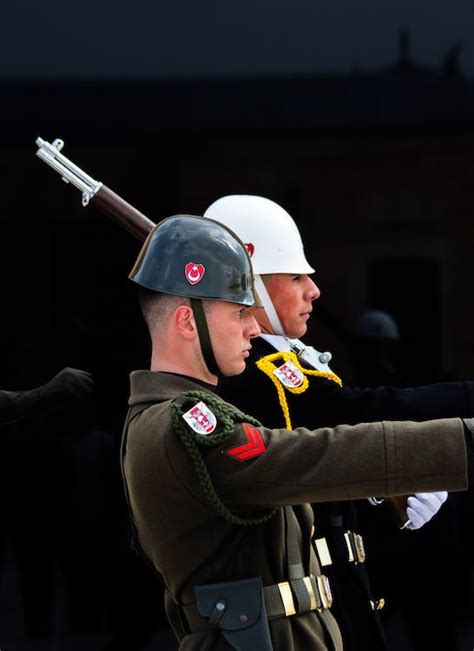 Soldiers in Uniforms Marching · Free Stock Photo