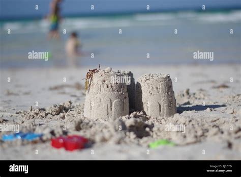 Sand Castle and Children Playing Stock Photo - Alamy