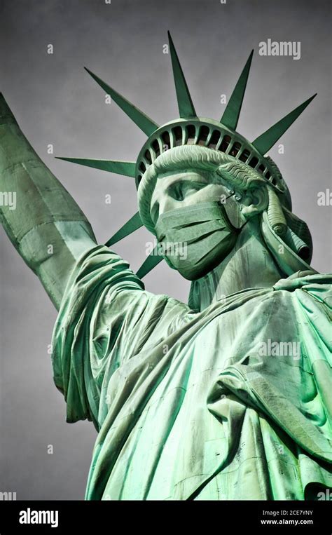 The statue of liberty wearing a mask. Coronavirus, Covid-19 outbreak in ...