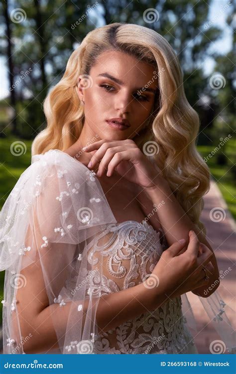 Vertical Shot Of The Pretty Woman With Nude Makeup Wearing A Bride X27