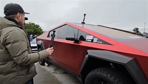 First Tesla Cybertruck In Red Shows Up And People Cant Help Staring