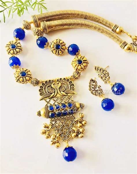 Peacock Blue Gemstone Antique Gold Tone Necklace Earrings Set At 3650