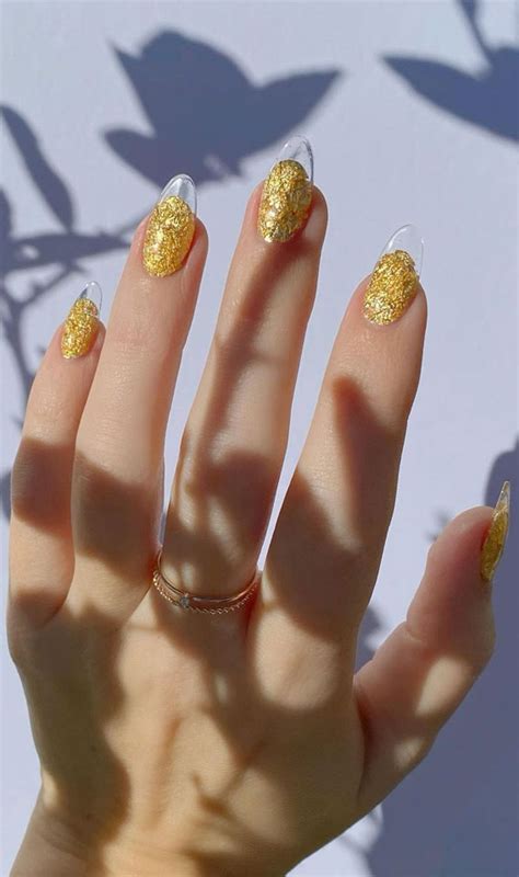 French Glass Nails That Re Sophisticated And Understated Gold Nails