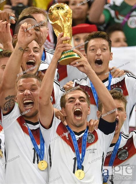 Dpatopbilder Philipp Lahm C Of Germany Lifts Up The World Cup Trophy