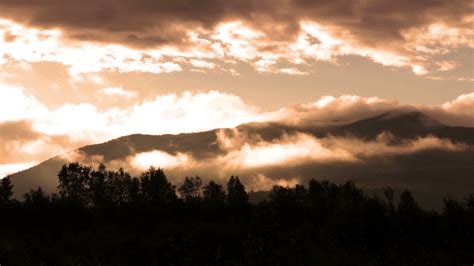 Mountain And Clouds at Sunrise 1626845 Stock Video at Vecteezy