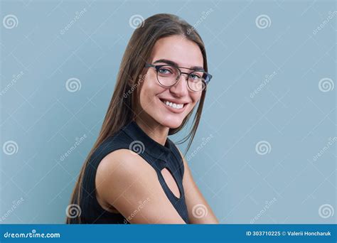 Headshot Portrait Of Young Woman In Trendy Glasses On Gray Background