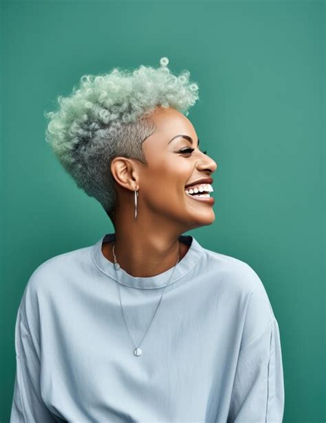 Premium Photo Portrait Of Smiling Black Woman Near A Green Wall