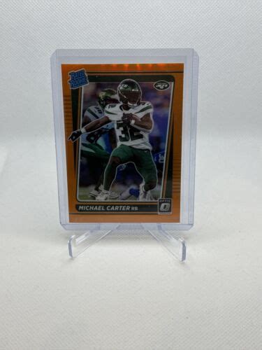 2021 Panini Donruss Optic Rated Orange Prizm 199 Michael Carter 235