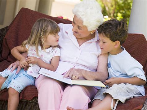 Grandmother Reading A Book To Grandchildren Royalty Free Stock Image