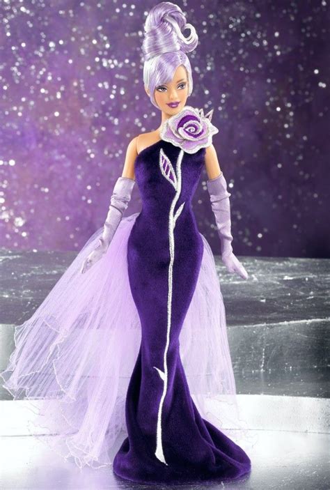 A Barbie Doll Wearing A Purple Dress And Tiara In Front Of A Star