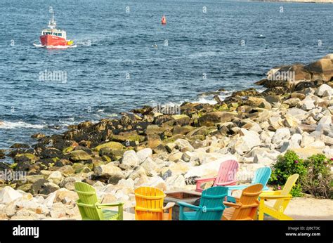 Fishing And Recreational Boats Parked In A Small Harbor Cove Stock