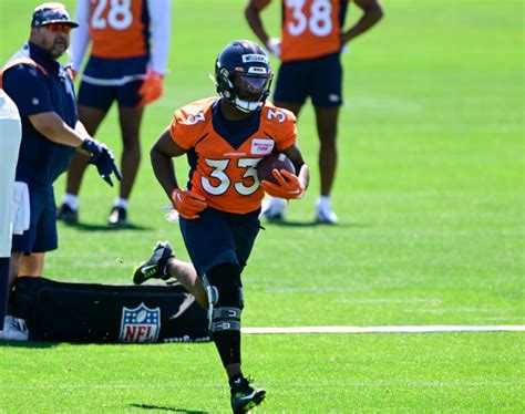 Javonte Williams, Broncos running back, participates in OTAs