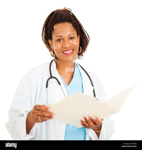 Beautiful African American Female Doctor Reading A Patients Medical