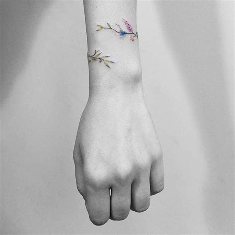 Never Take it Off: Stunning Floral Bracelet Tattoos • Tattoodo