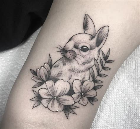 Cute Bunny Tattoo with Flower Design