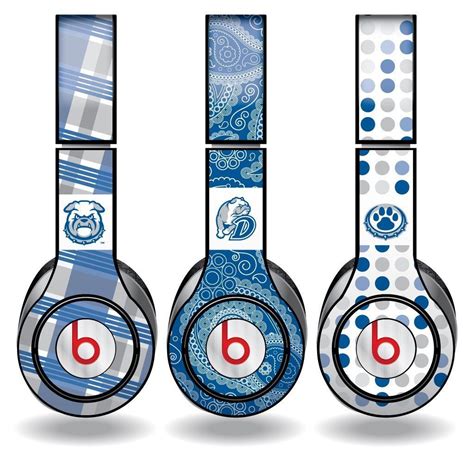 Three Headphones With Different Designs On Them