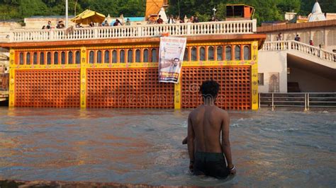 Man Bathing In Holy River Ganga Outdoor Shoot Hd Editorial Photography