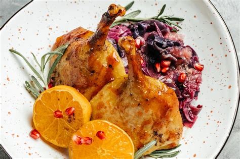 Premium Photo Roast Duck Leg Red Cabbage Homemade With Rosemary And