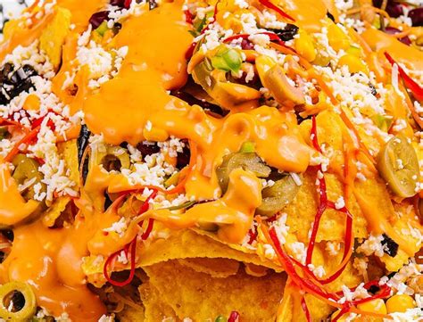 Premium Photo Mexican Nachos With Salsa And Guacamole