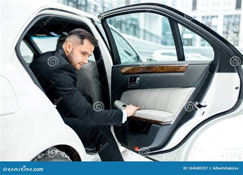 car side view  man     white auto