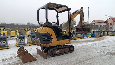 Minikoparka Cat T Caterpillar Yanmar Sv Su W