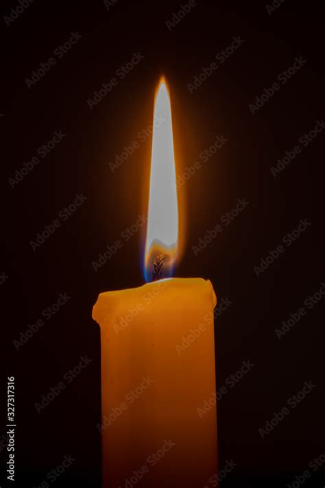 candle in the dark Stock Photo | Adobe Stock