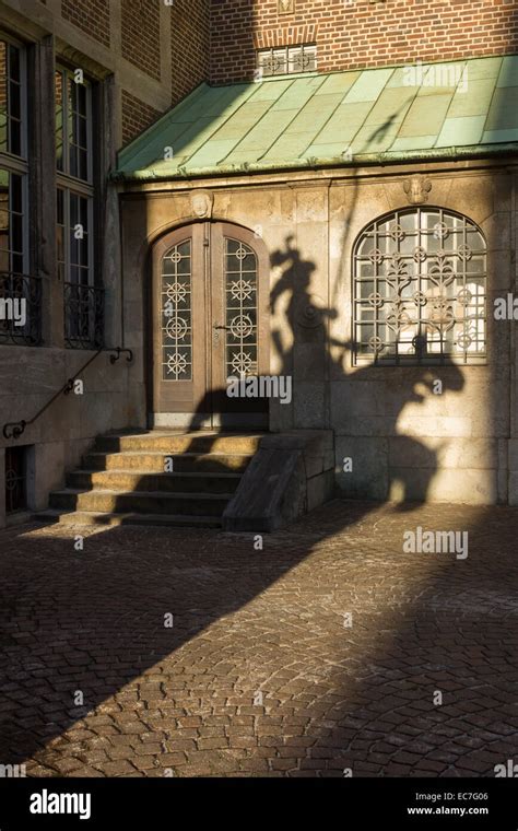 Germany Bremen Shadow Of Herald On Facade Of City Hall Stock Photo