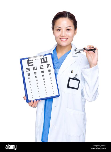 Optician Doctor Hold Eye Chart And Glasses Stock Photo Alamy