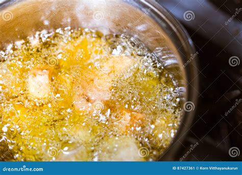 Deep frying on hot oil. stock image. Image of fryer, crispy - 87427361