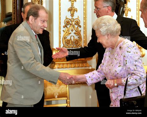 Queen Elizabeth Ii Shakes Hands With Artist Hi Res Stock Photography