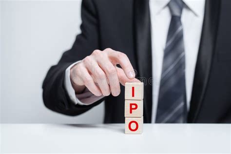 Wooden Cubes With Word Business Ipo Concept Businesman In Suit Stock