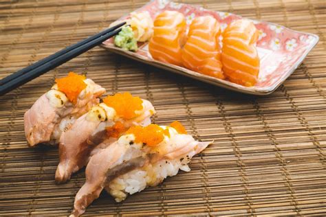 Sushi Salmon on wooden table 8259596 Stock Photo at Vecteezy