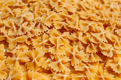 Premium Photo Uncooked Bow Tie Pasta Background