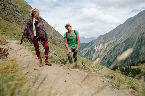 A Couple Hiking Up In The Mountains. by Denni Van Huis - Hike, Couple