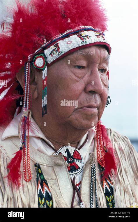 Elderly Native American Indian Chief Wearing Traditional Ceremonial War