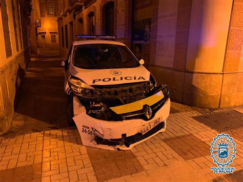 Detenido un delincuente en Málaga tras embestir con un coche robado y