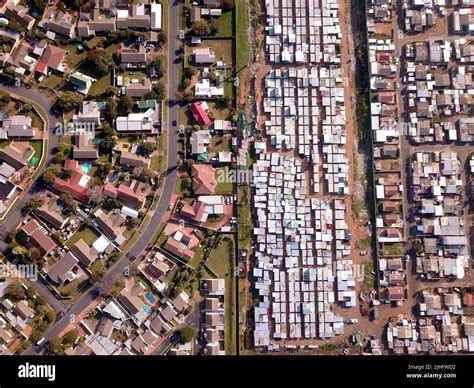 Aerial Overhead Township And Wealthy Suburb In South Africa Stock Photo